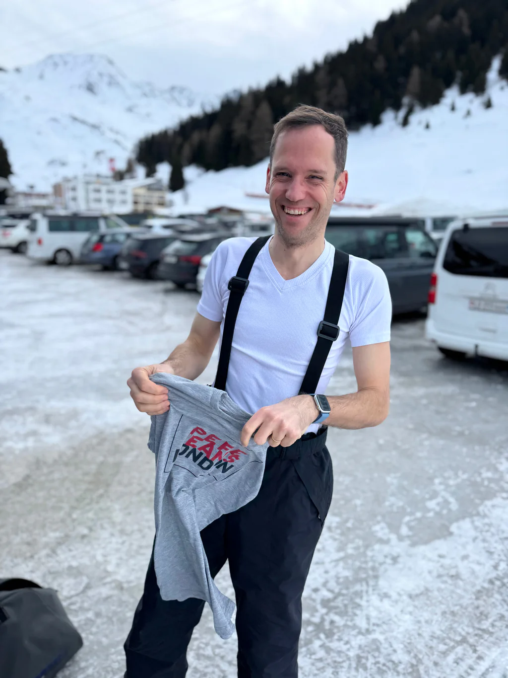 A smiling Peptone team member getting ready for a ski day in Andermatt