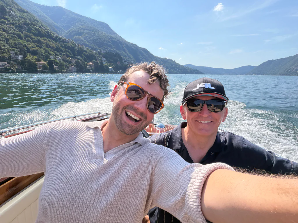 Two Peptone team members beside a mountain lake in summer